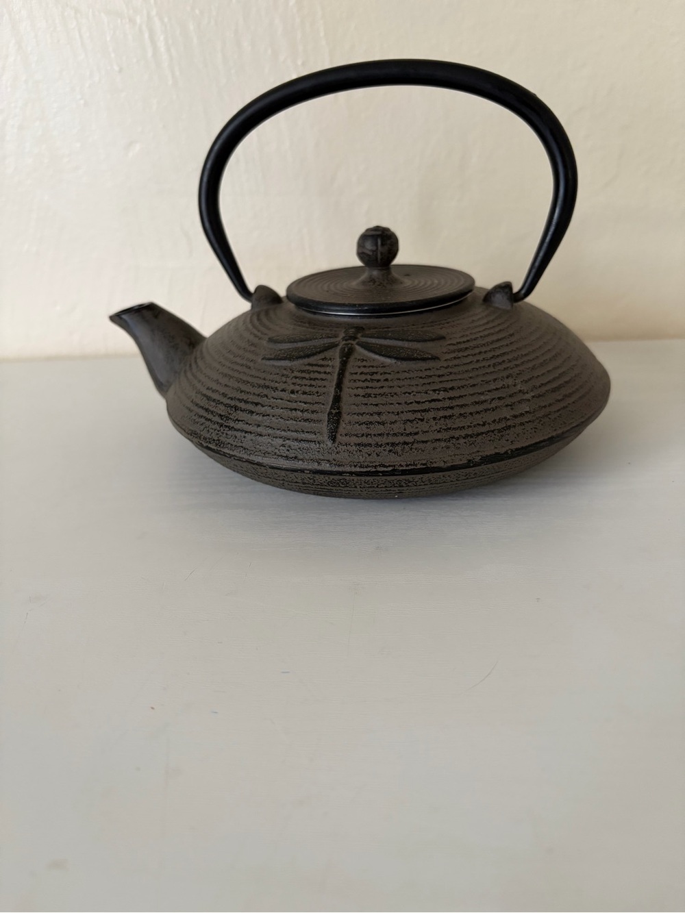 Black Cast Iron Dragonfly Motif Teapot with Curved Handle